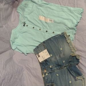 Size 14 girls shorts and shirt. So from Kohl's new with tags.